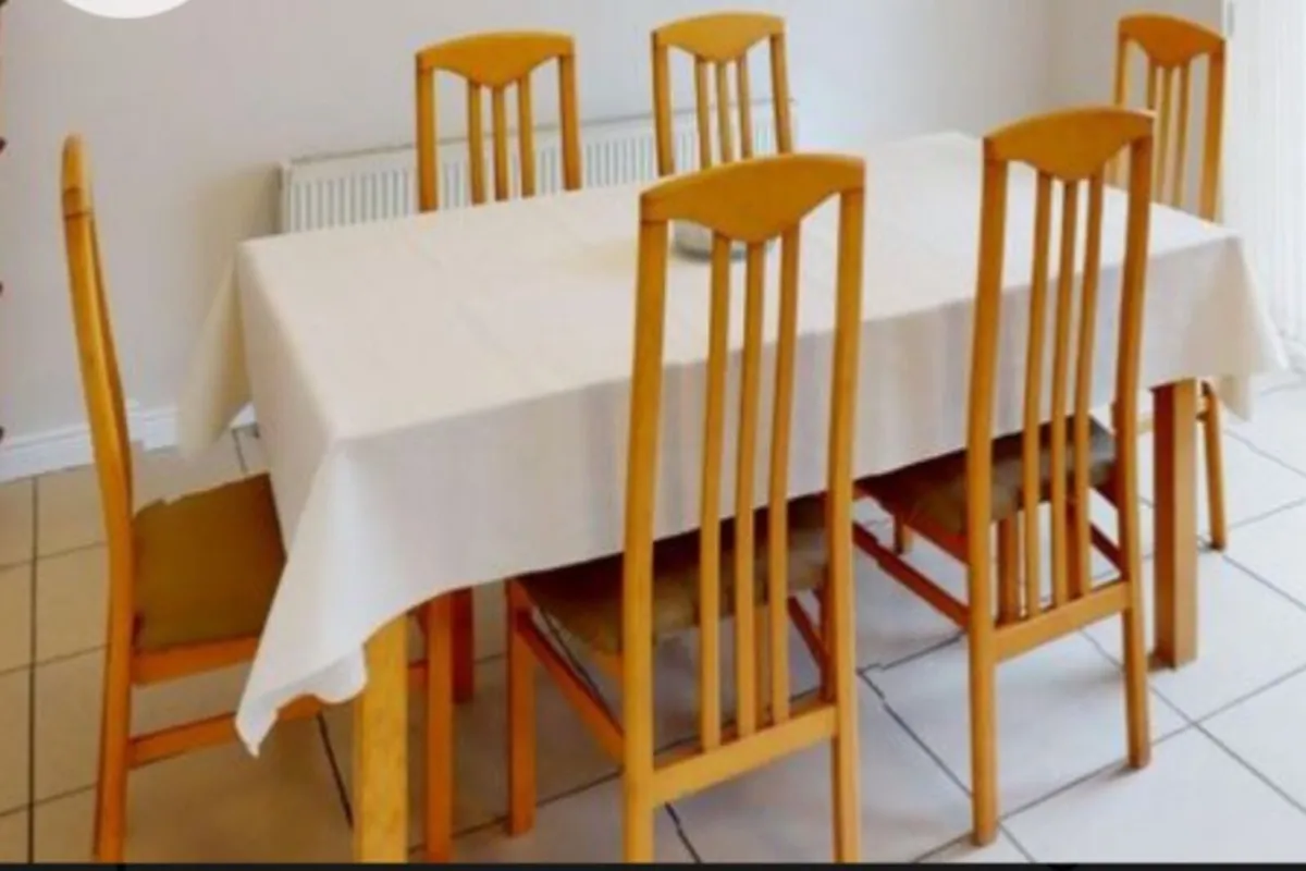 Table & 6 solid wood chairs.