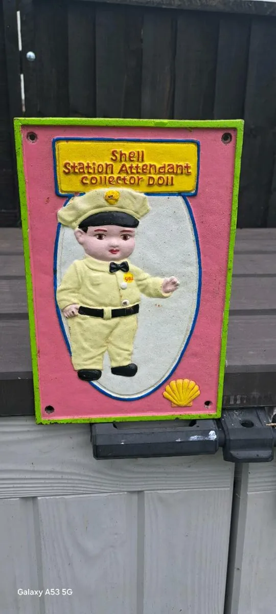 Shell  cast  iron  sign