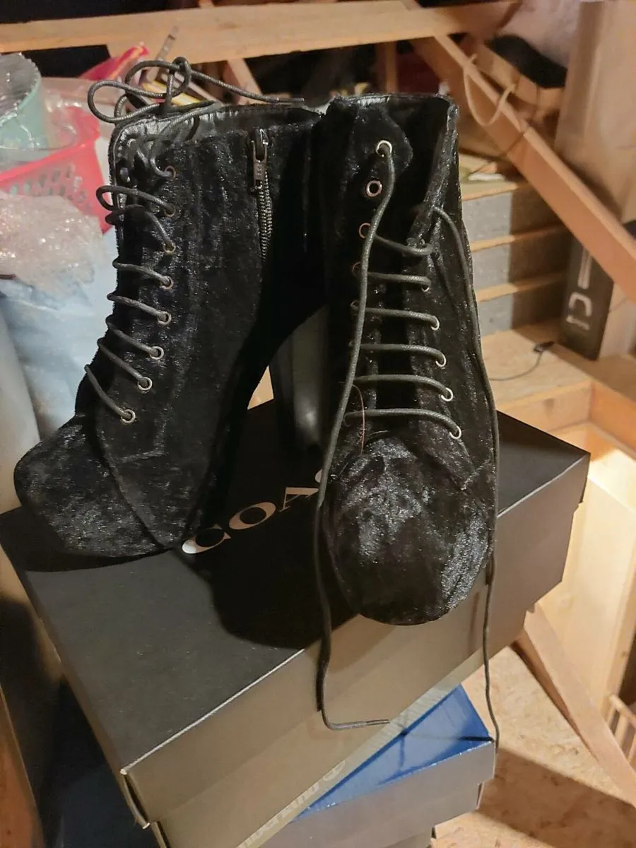 Boots. Never worn