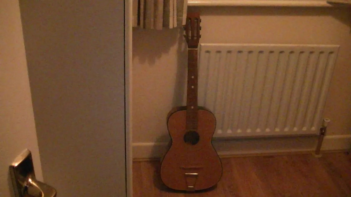 Small Oldish Guitar - Image 1
