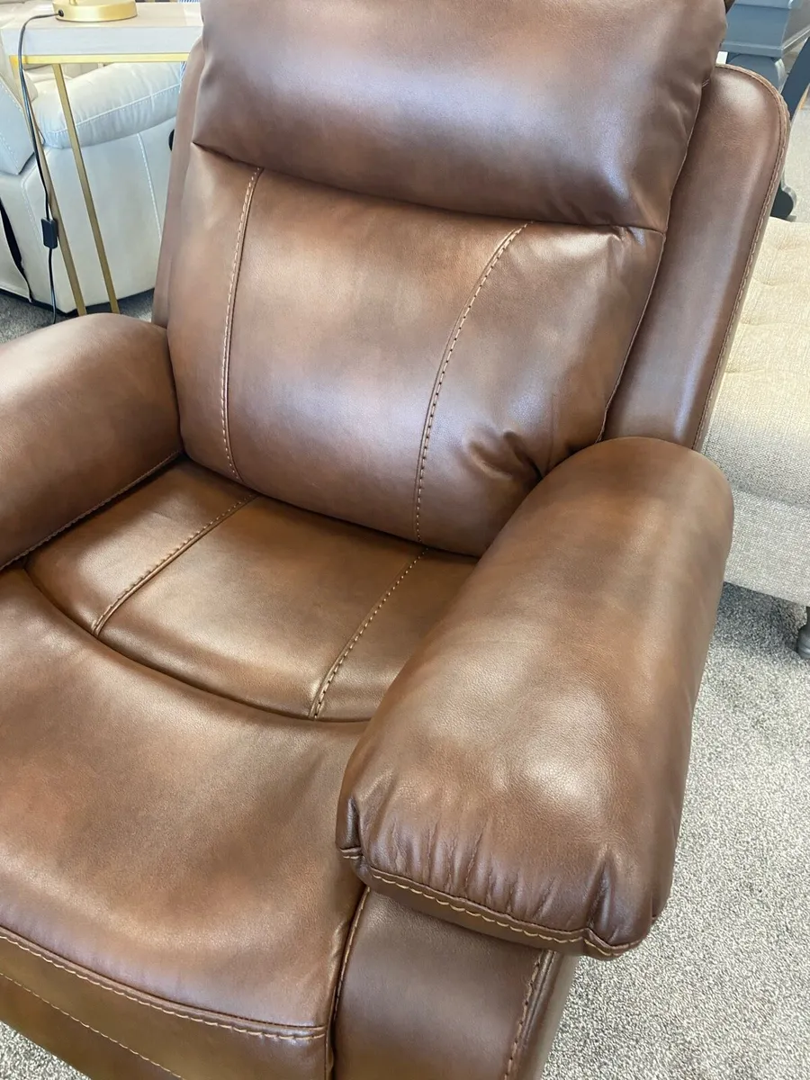 Itaialan leather recliner arm chair reduced clea