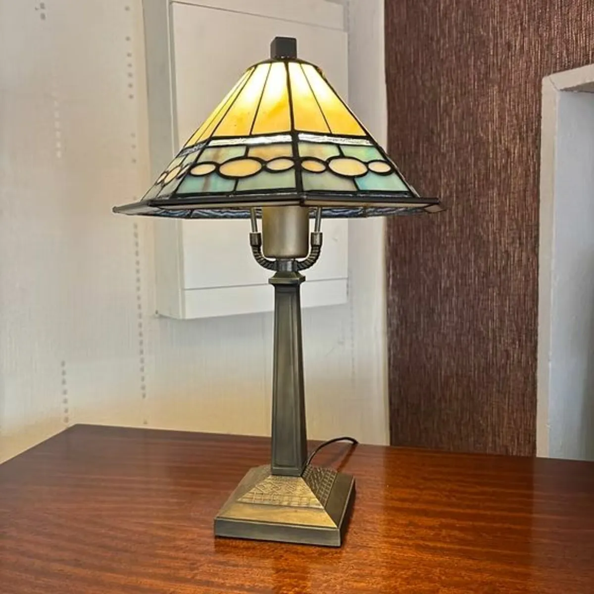 Tiffany style stained glass and bronzed metal tabl