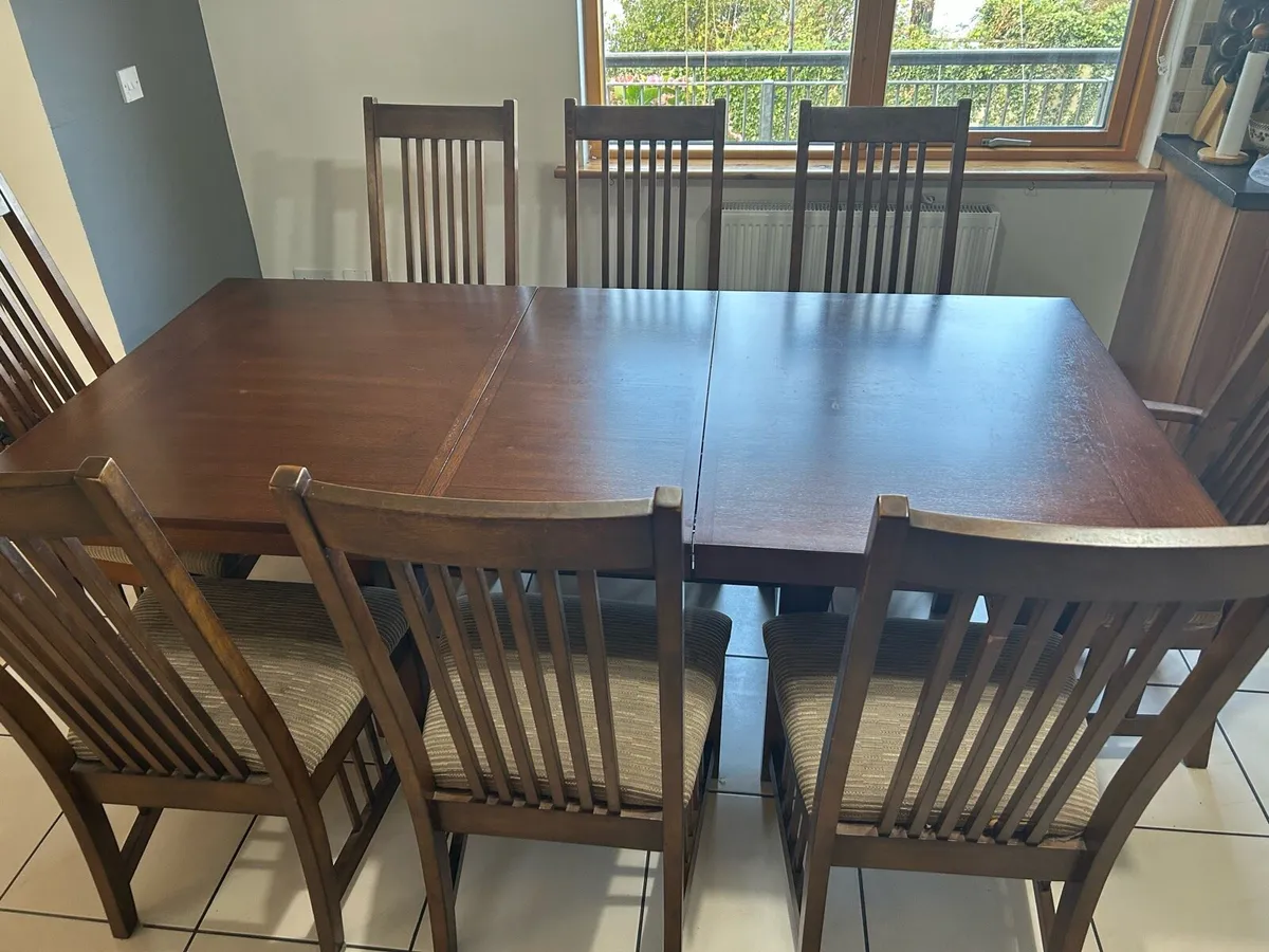 Dining Table and 8 Chairs - Image 1