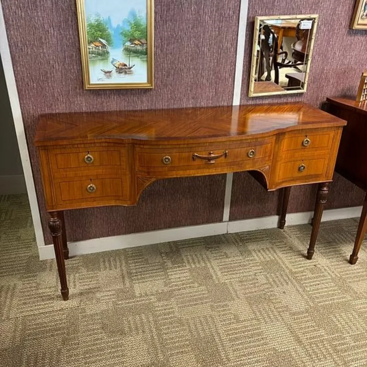 Beautiful mahogany serpentine sideboard. Enclosed