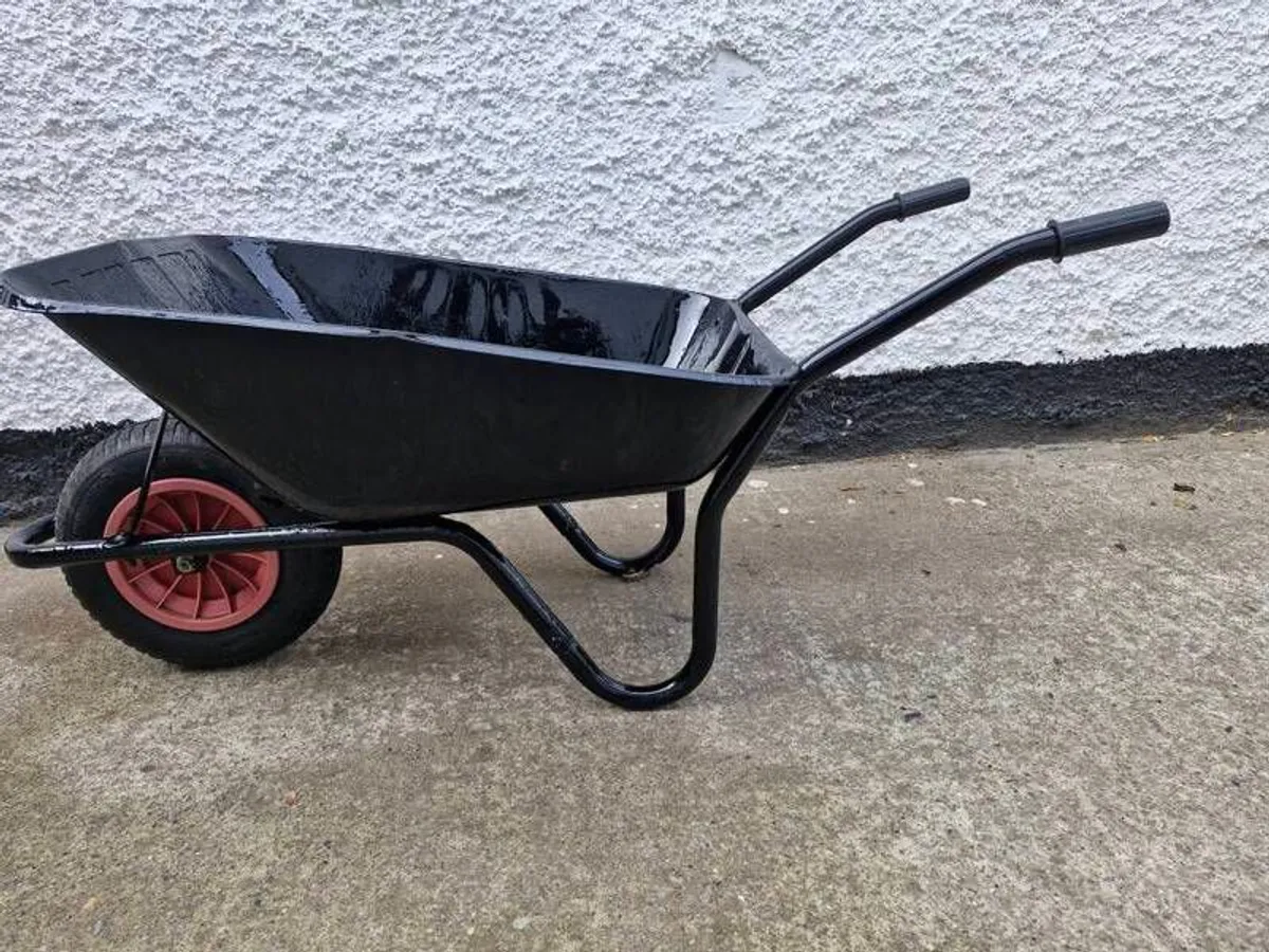 metal wheel barrow freshly painted in great condition - Image 1