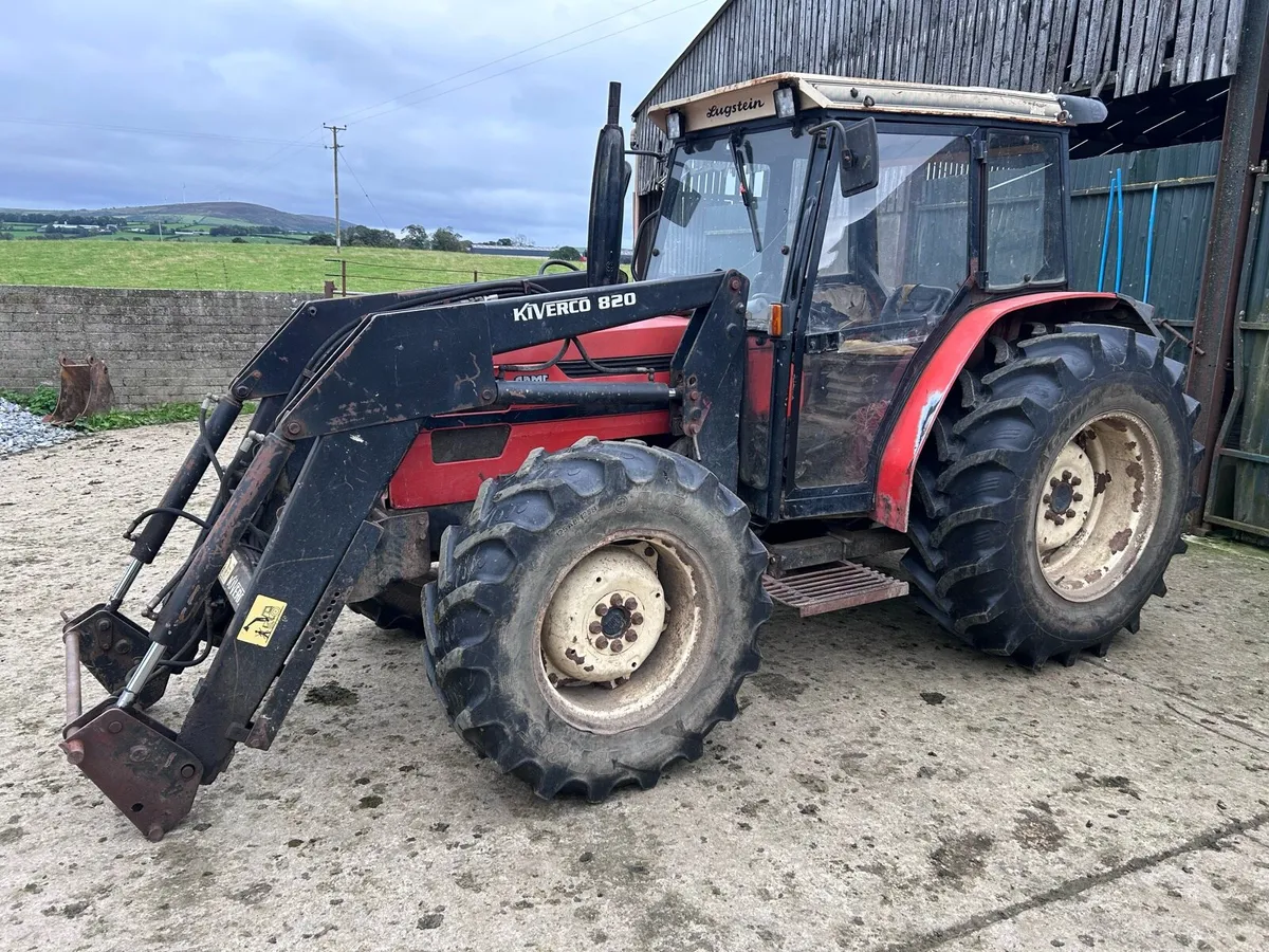 Tractor with loader - Image 1