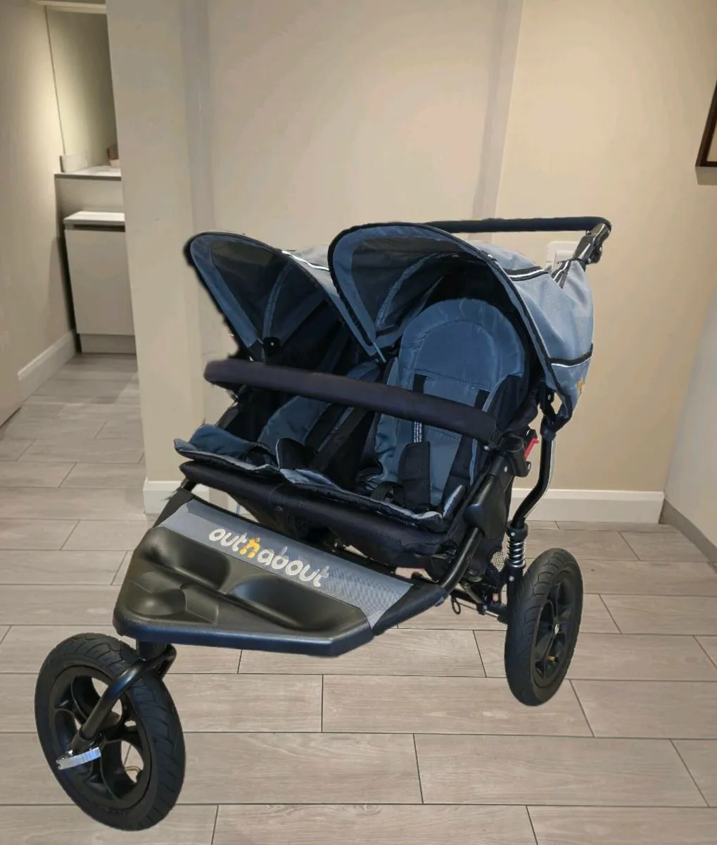 Out N About Double buggy with raincover - Image 1