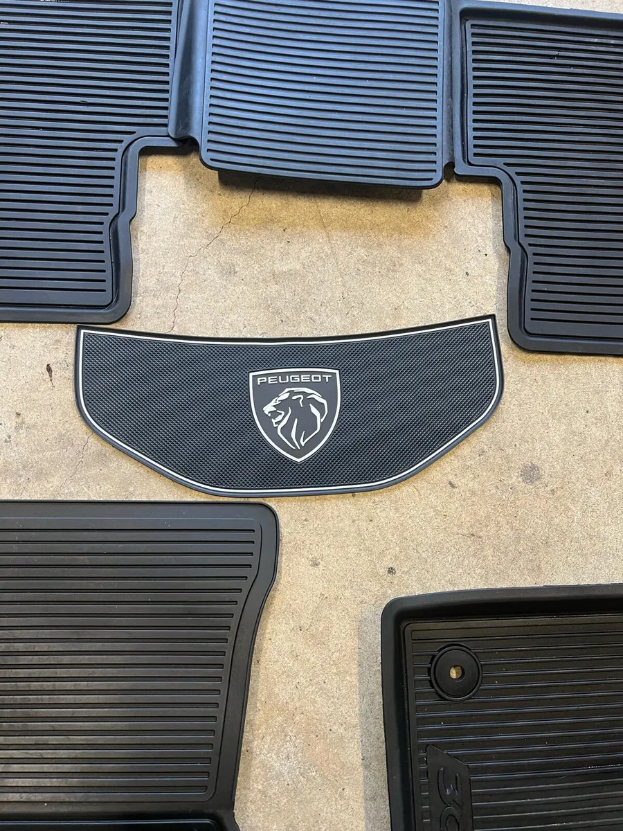 Genuine Peugeot car mats plus one alloy wheel - Image 1