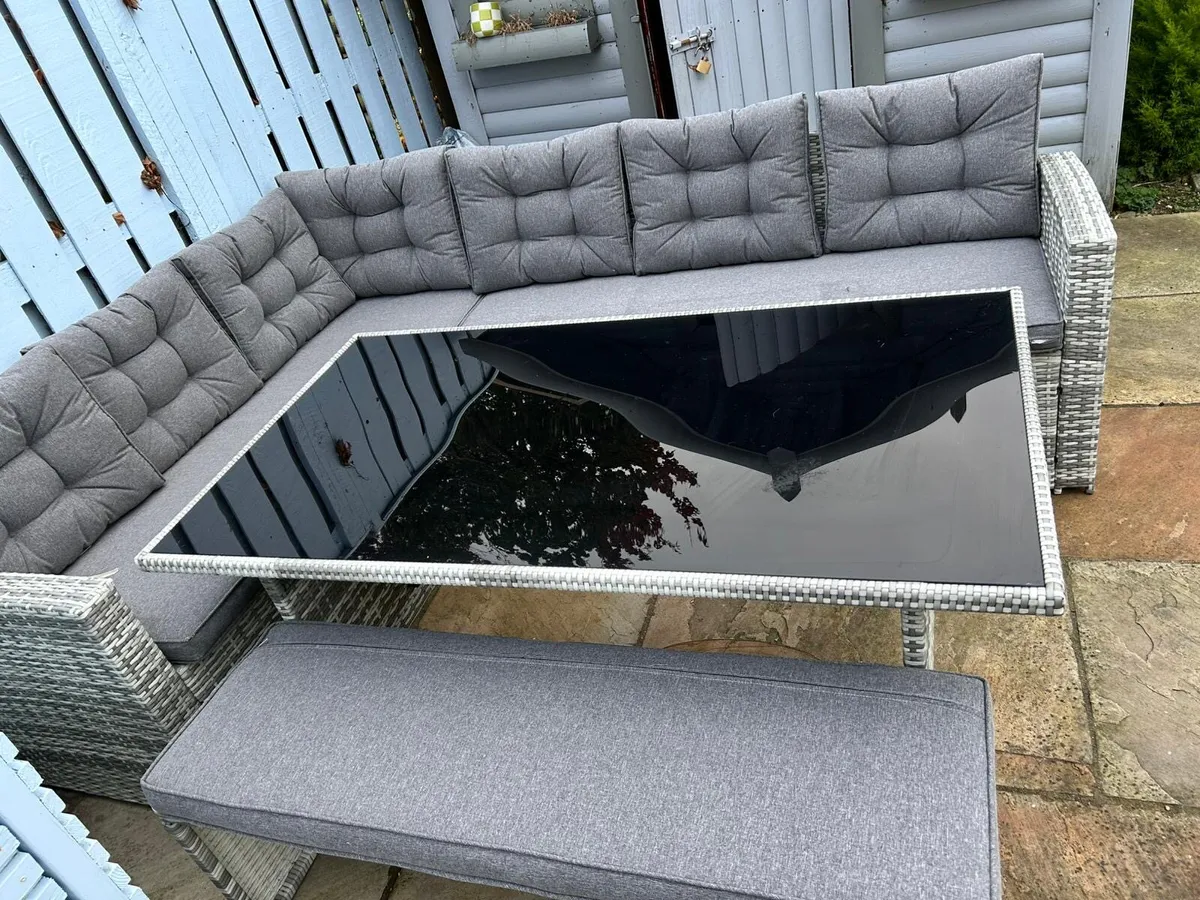 Outdoor L shaped table and couch set - Image 1