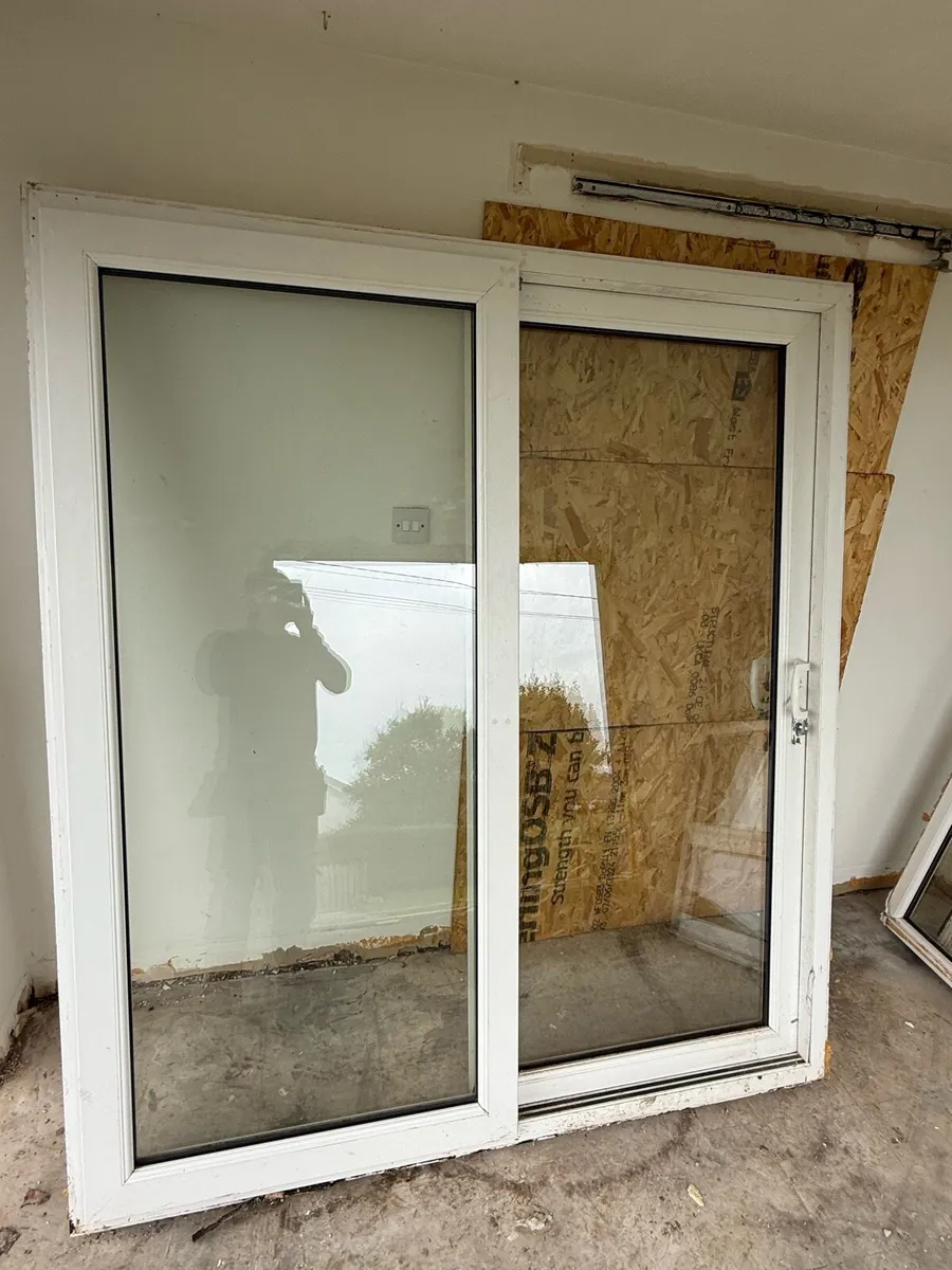 PVC double glazed sliding door.