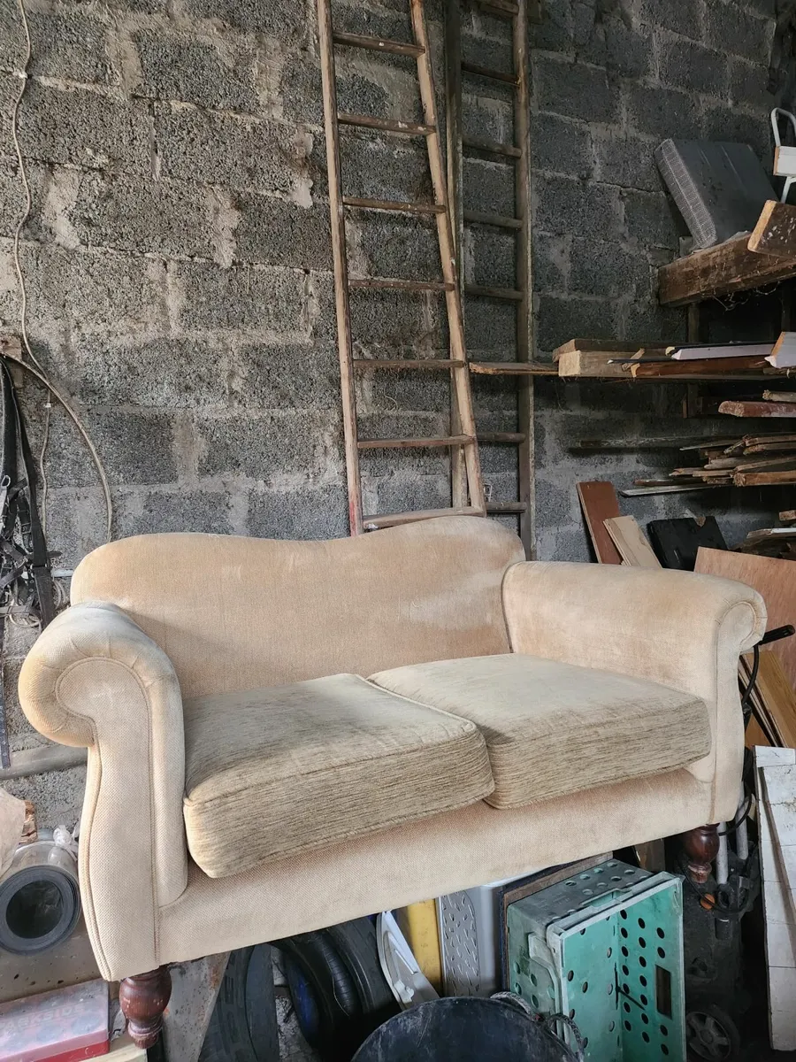 2 seater cream sofa