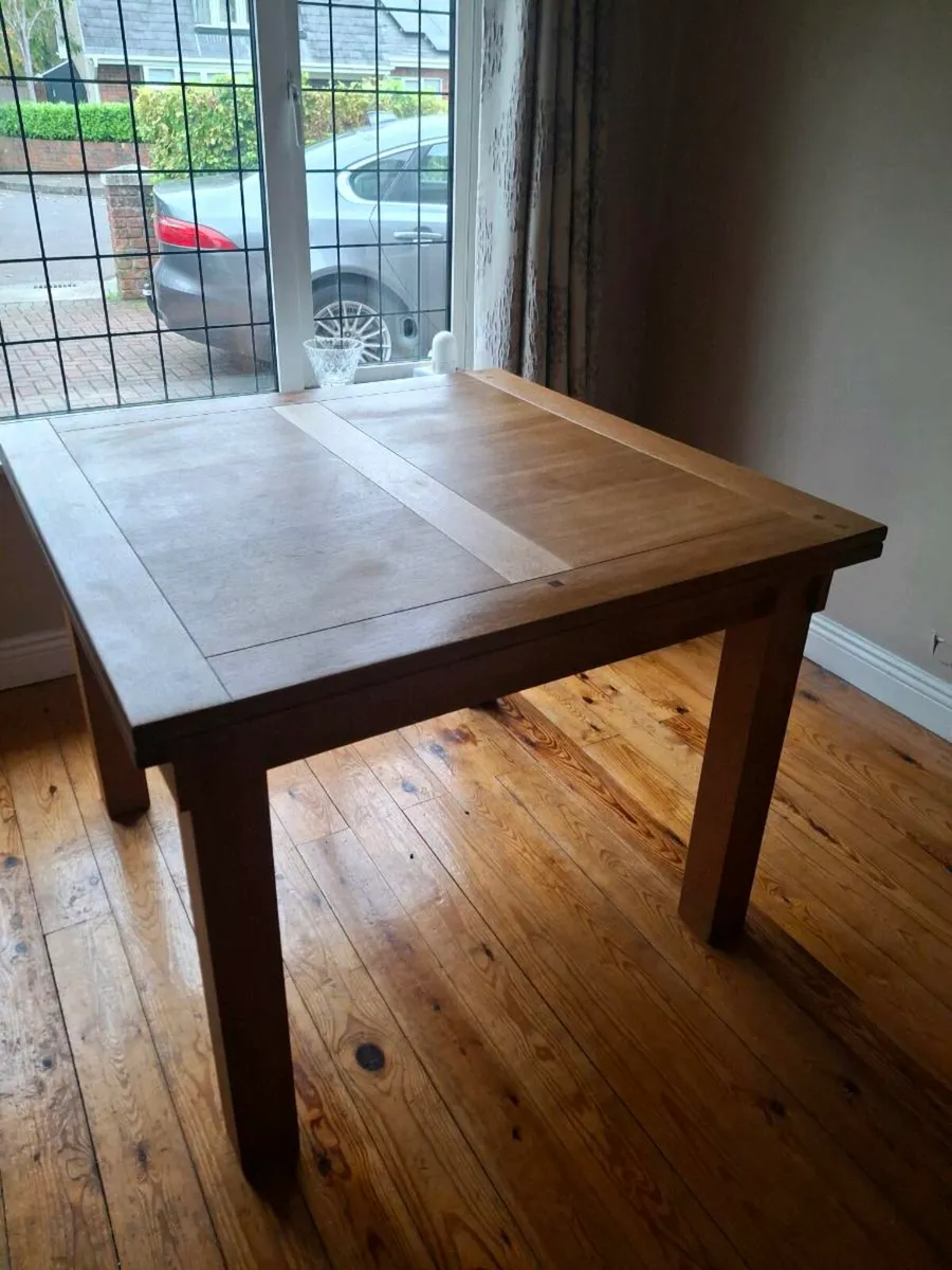 Solid wood dining table - Image 1