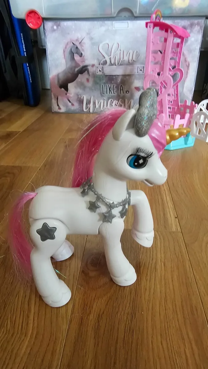 Girl pets alive unicorn and stable - Image 2