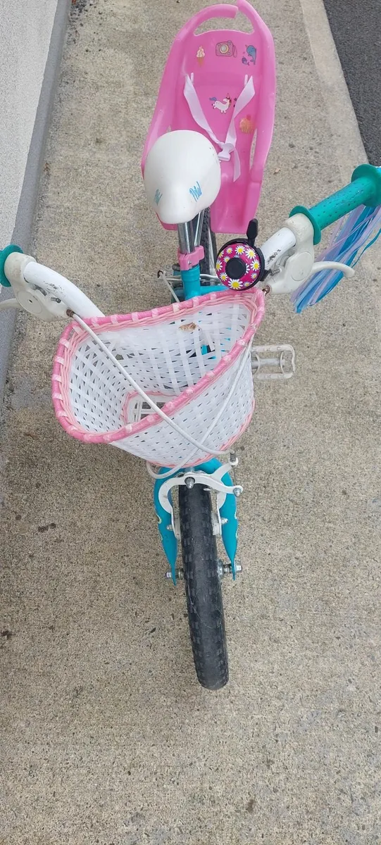 Bicycle with baby seat and basket - Image 1