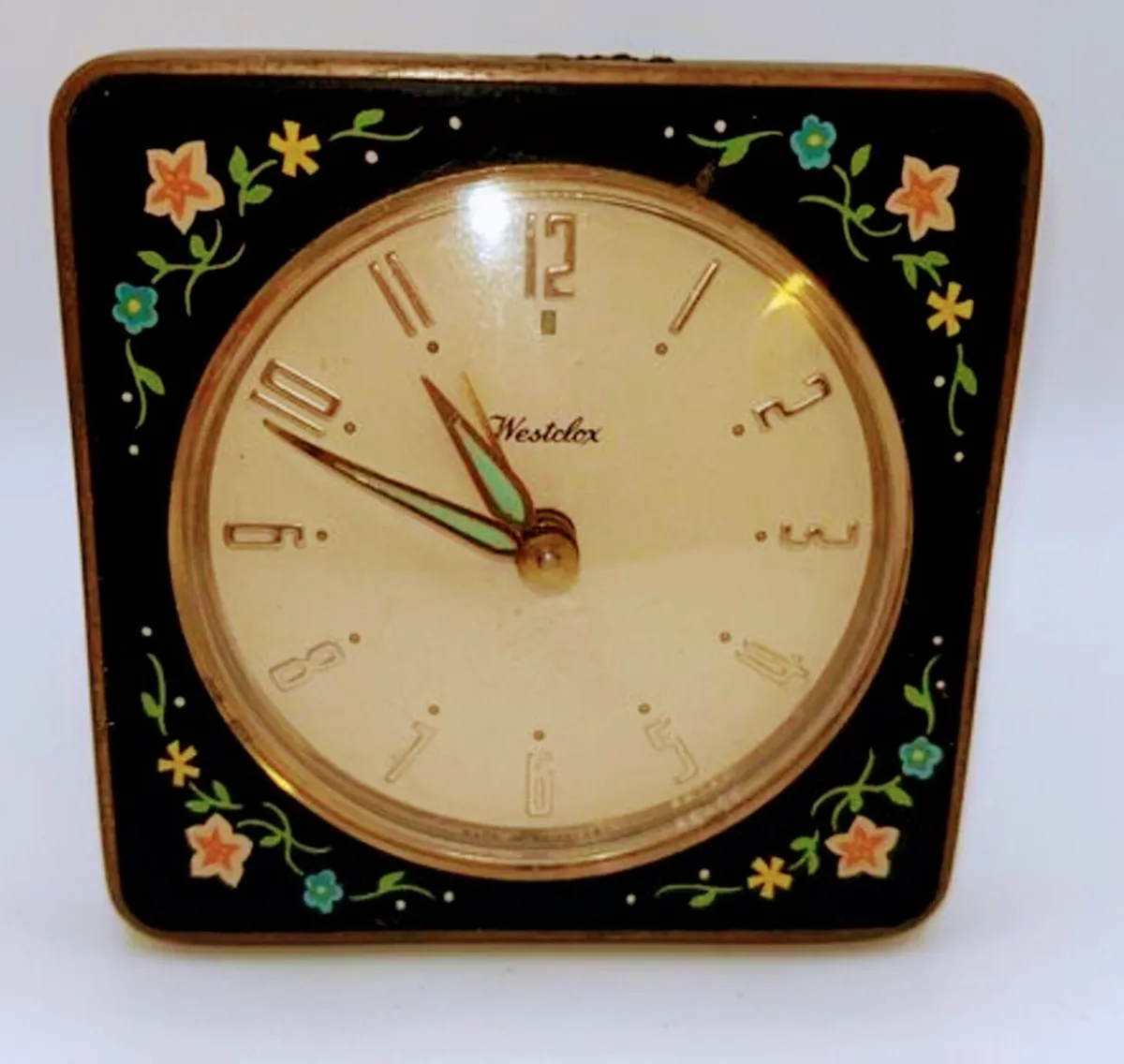 Vintage  Westclox beside clock