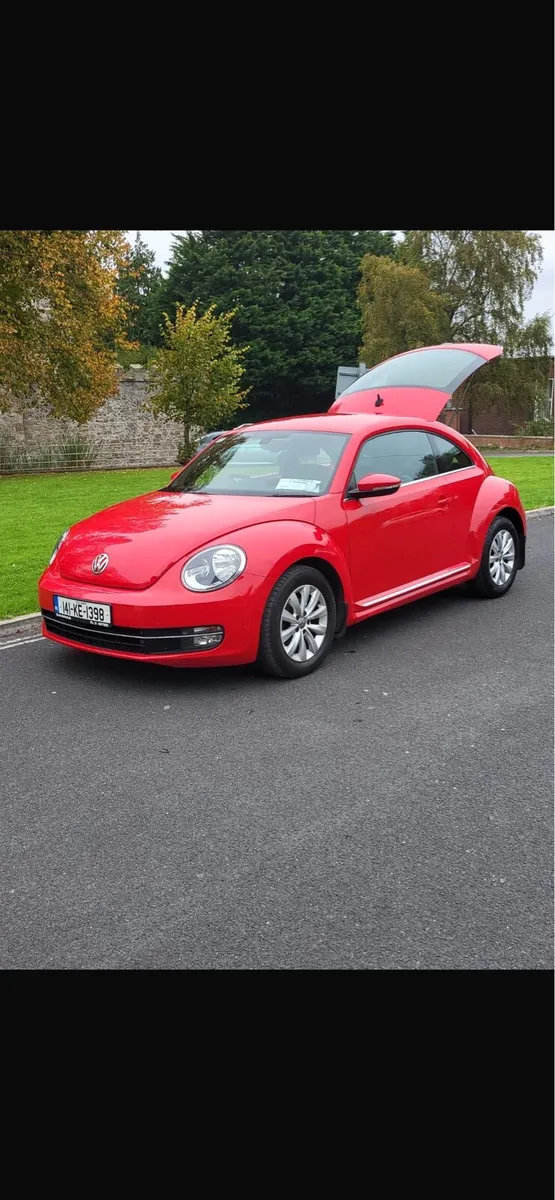 Red Volkswagen Beetle - Image 1