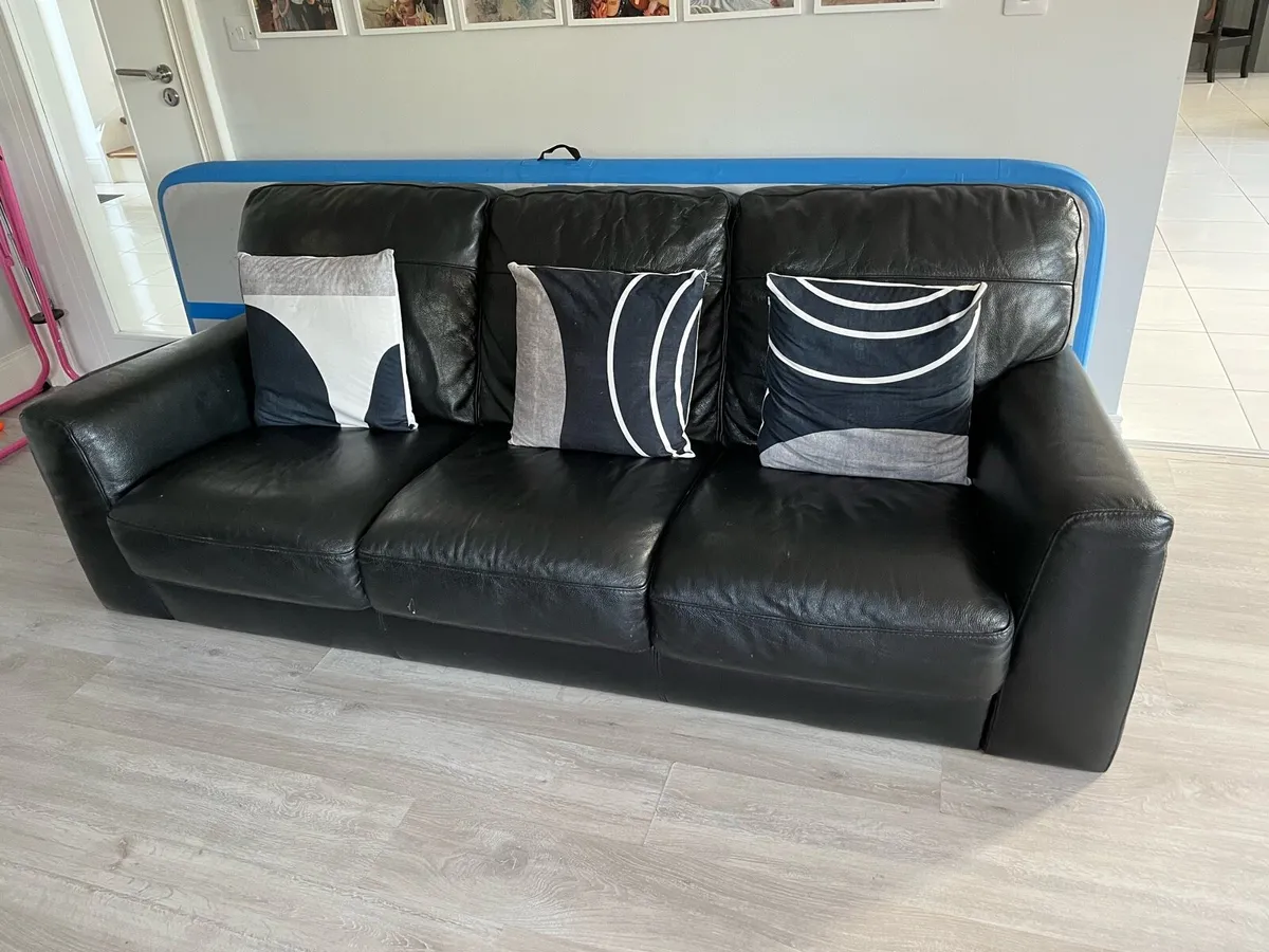 Black leather sofa from Harvey Norman’s 3seater - Image 1