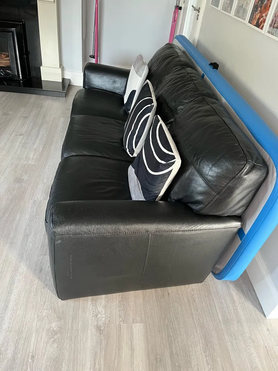 Black leather sofa from Harvey Norman’s 3seater - Image 4