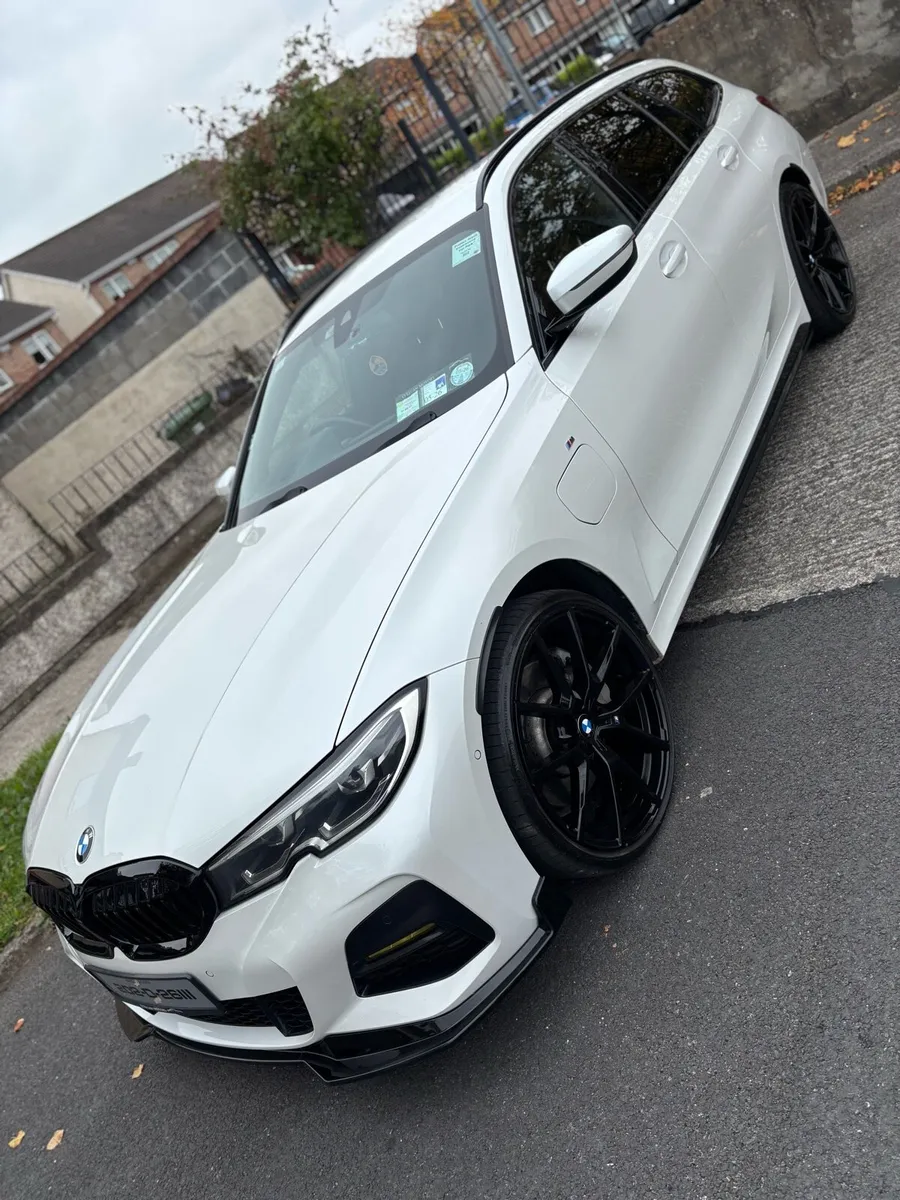 BMW 330e m sport touring with warranty 14 months - Image 1