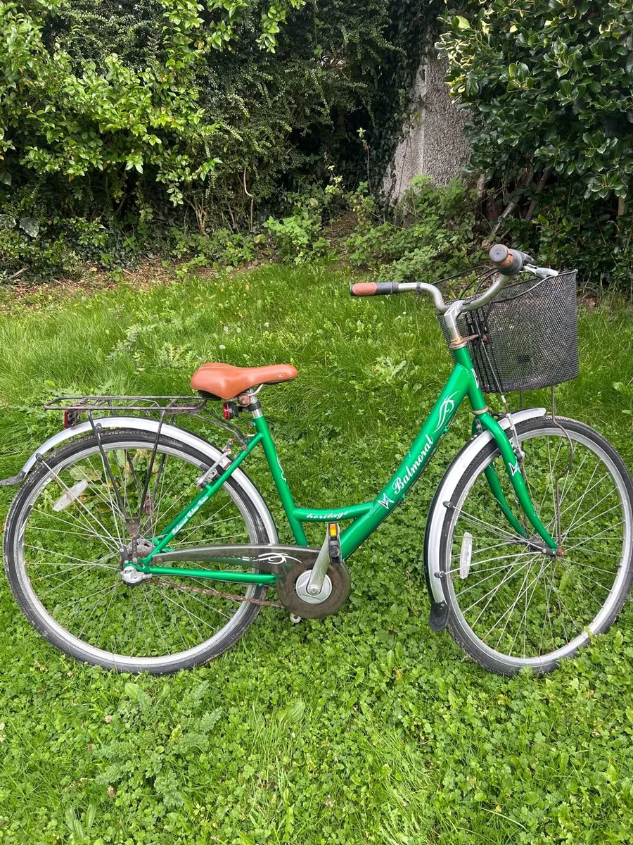 Bicycle, Helmet, Lock, and Light - Image 1