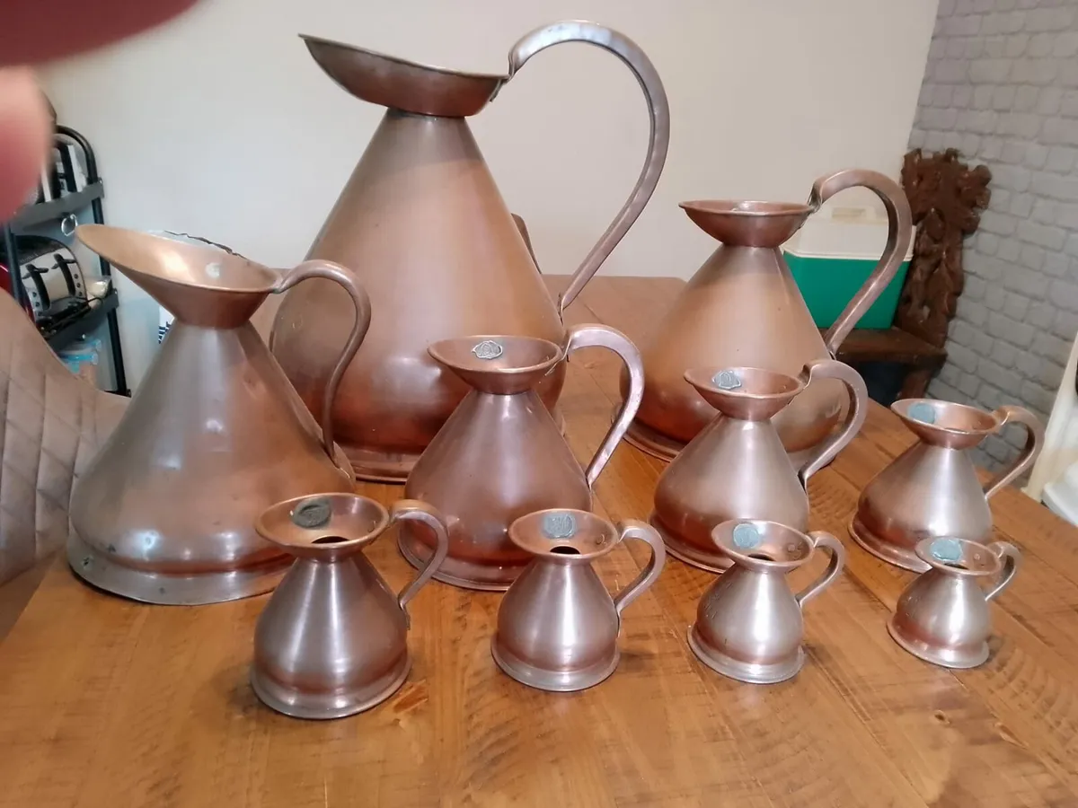 Vintage copper mesuring jug collection - Image 1