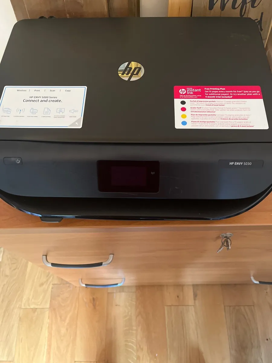 A brand new HP Envy 5030 printer and photocopier.