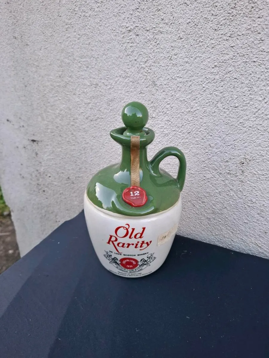 Old rarity whiskey bottle postage possible