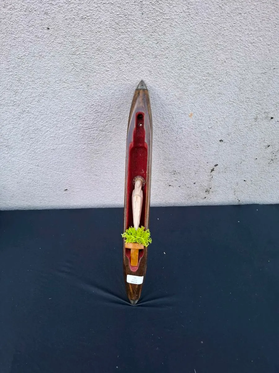 Religious loom shuttle possible to post