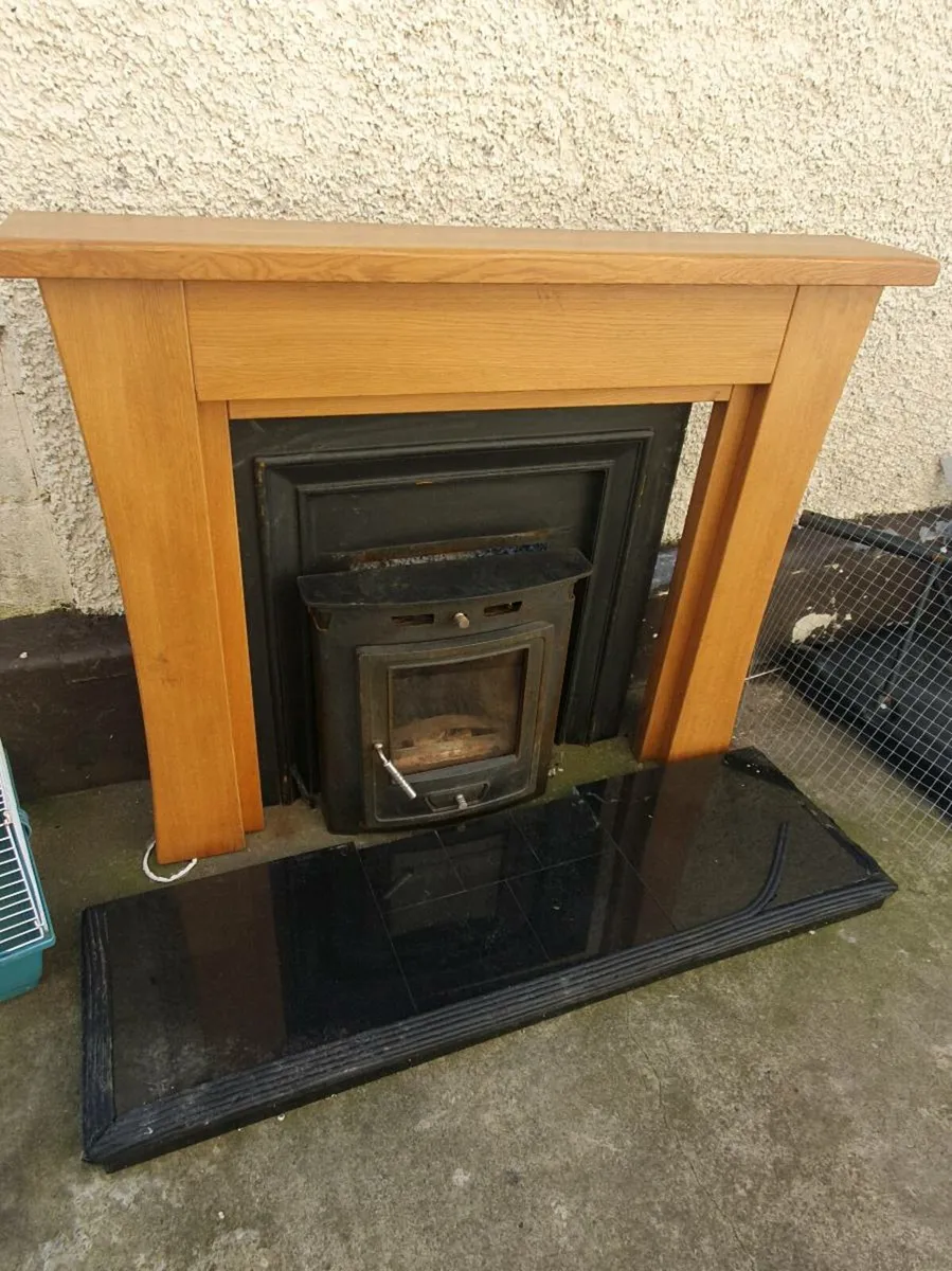 Inset stove and oak mantle