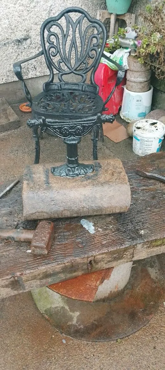 Vintage boot scraper set in granite stone