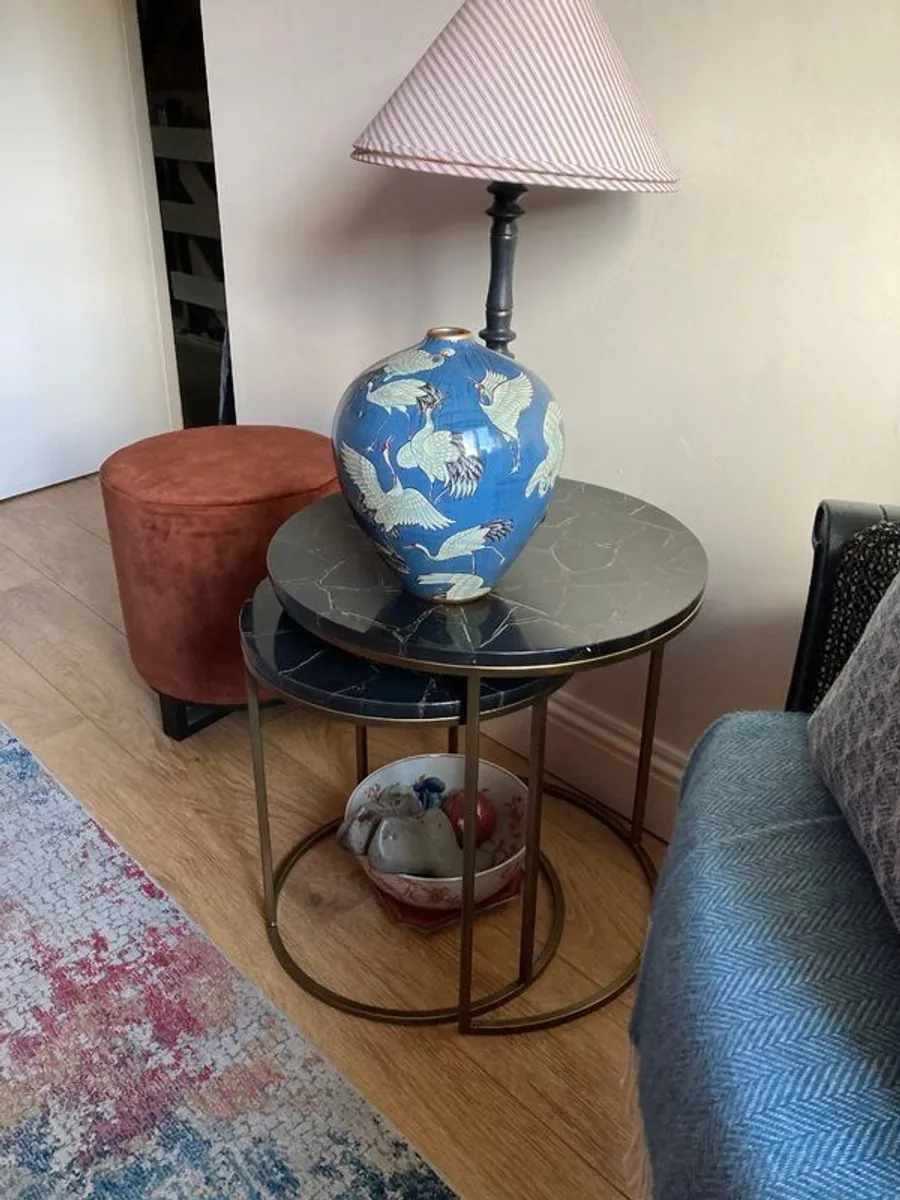 Tables:2 round side tables with marble look tops. - Image 1