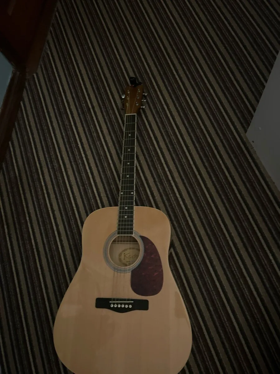 Guitar with capo and tuner
