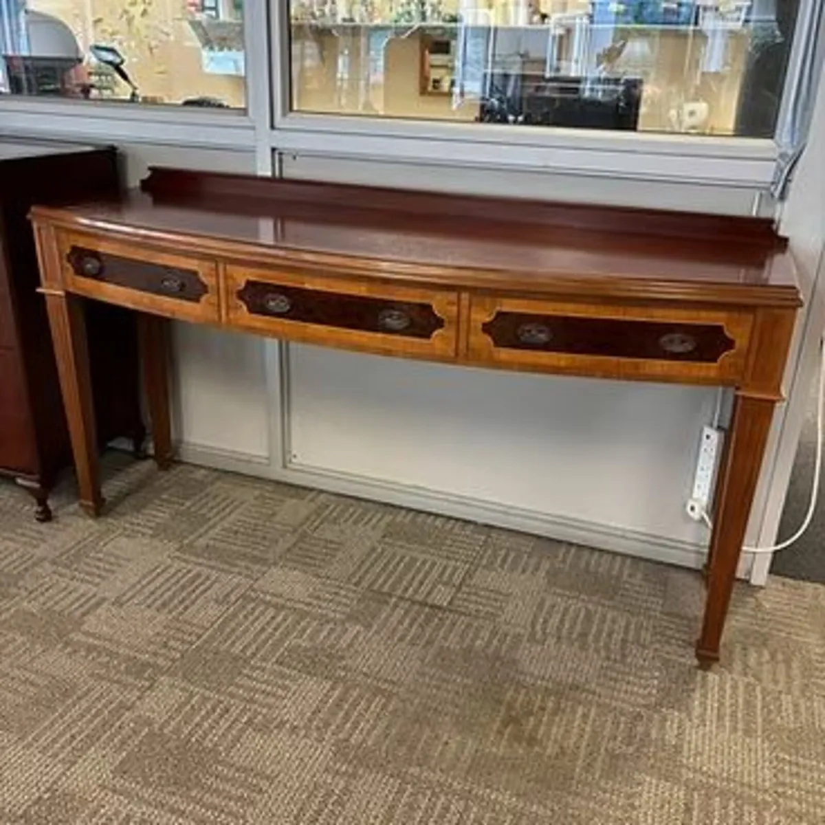 Georgian bow front console table with inlaid satin