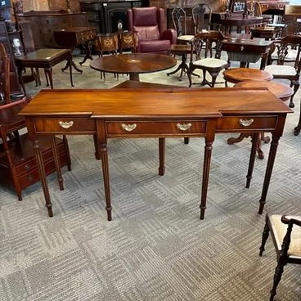 Fabulous mahogany breakfront three drawer console