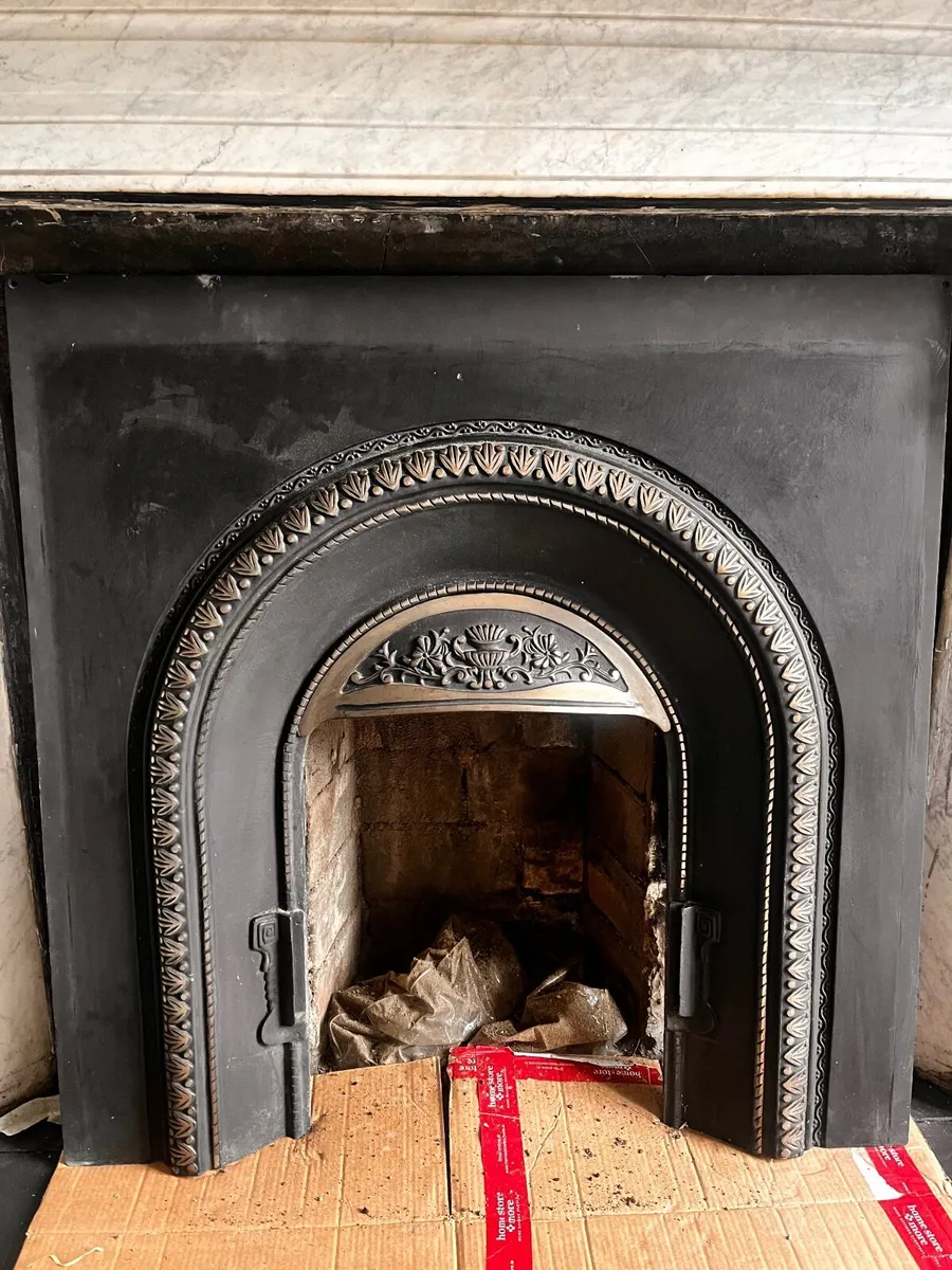 Cast iron fireplace insert