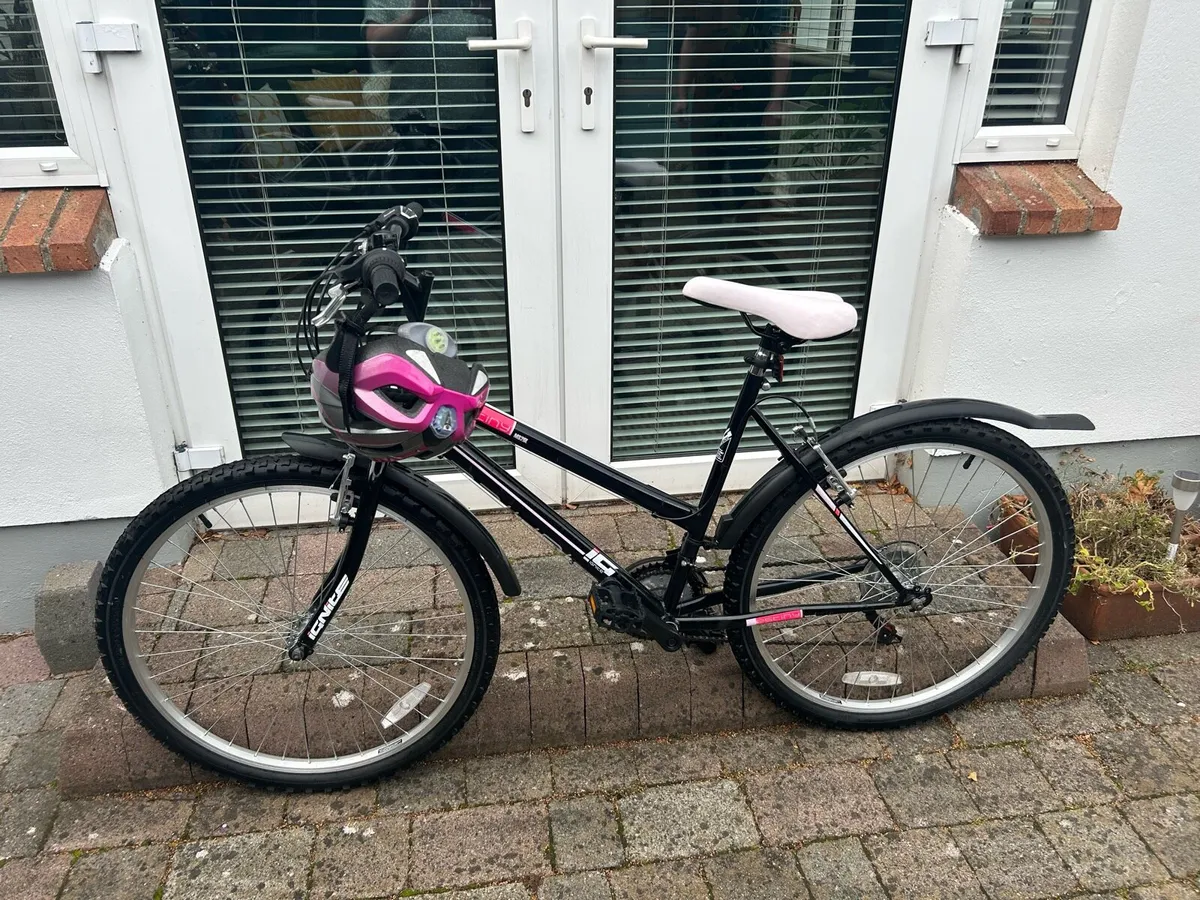 26-inch black/pink bike for 10-14 year old girl - Image 1