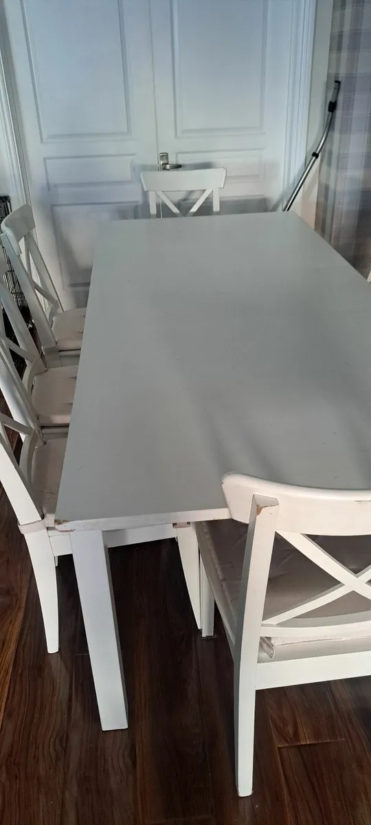 white  kitchen table plus  8 matching   chairs - Image 1