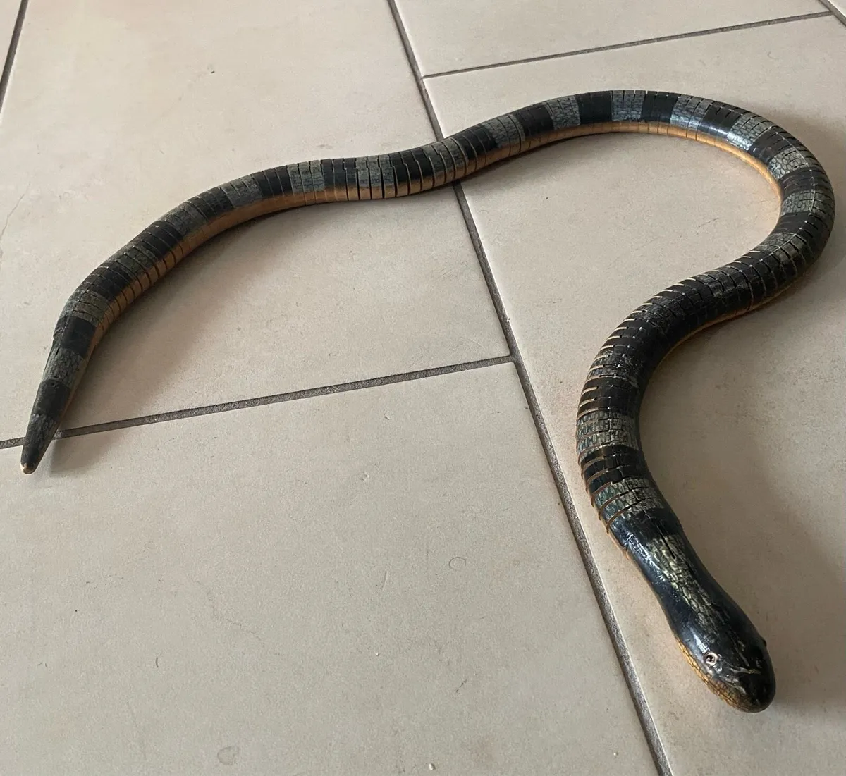 Hand Carved Movable Snake Sculpture - Image 1