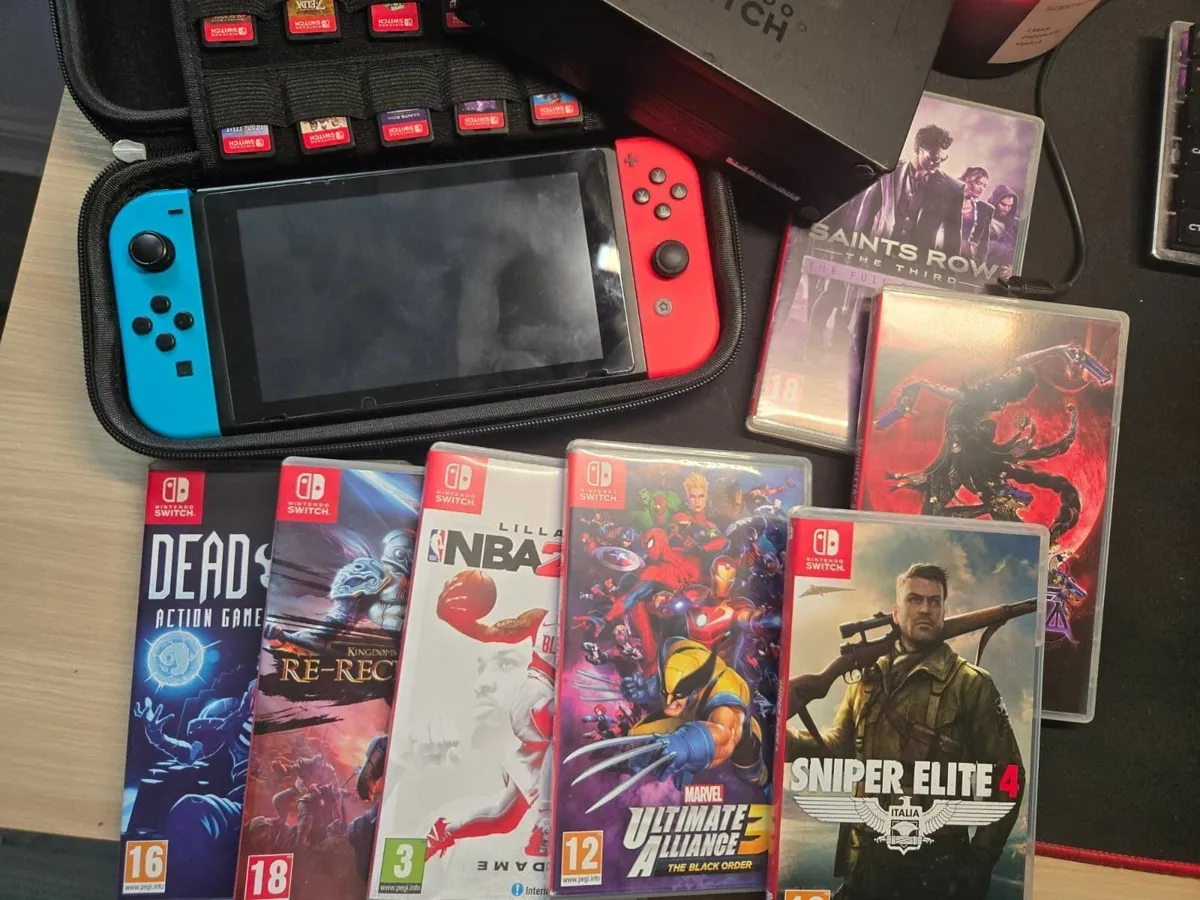 Nintendo Switch + 7 games (box) + case