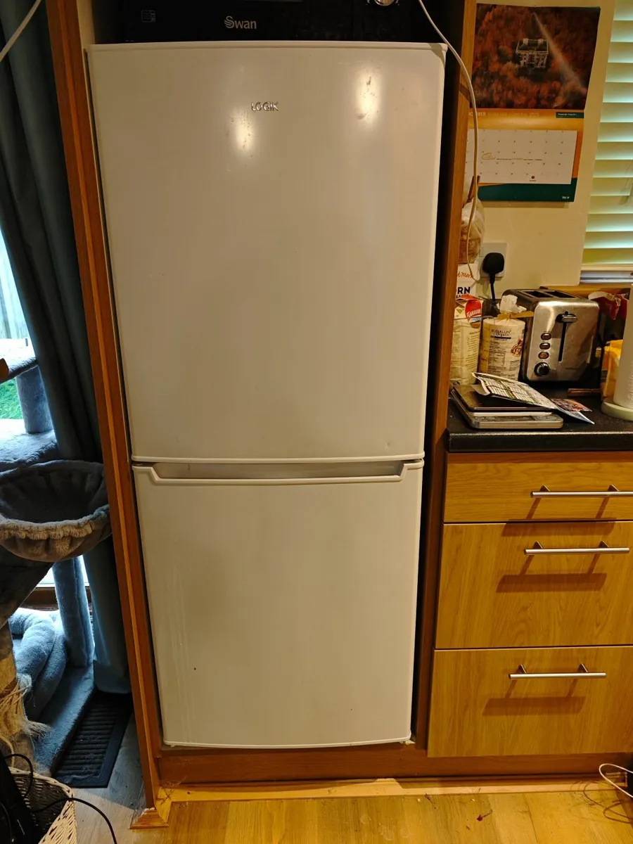 1 yr LOGIK LE55CW23 50/50 Fridge Freezer - Image 1