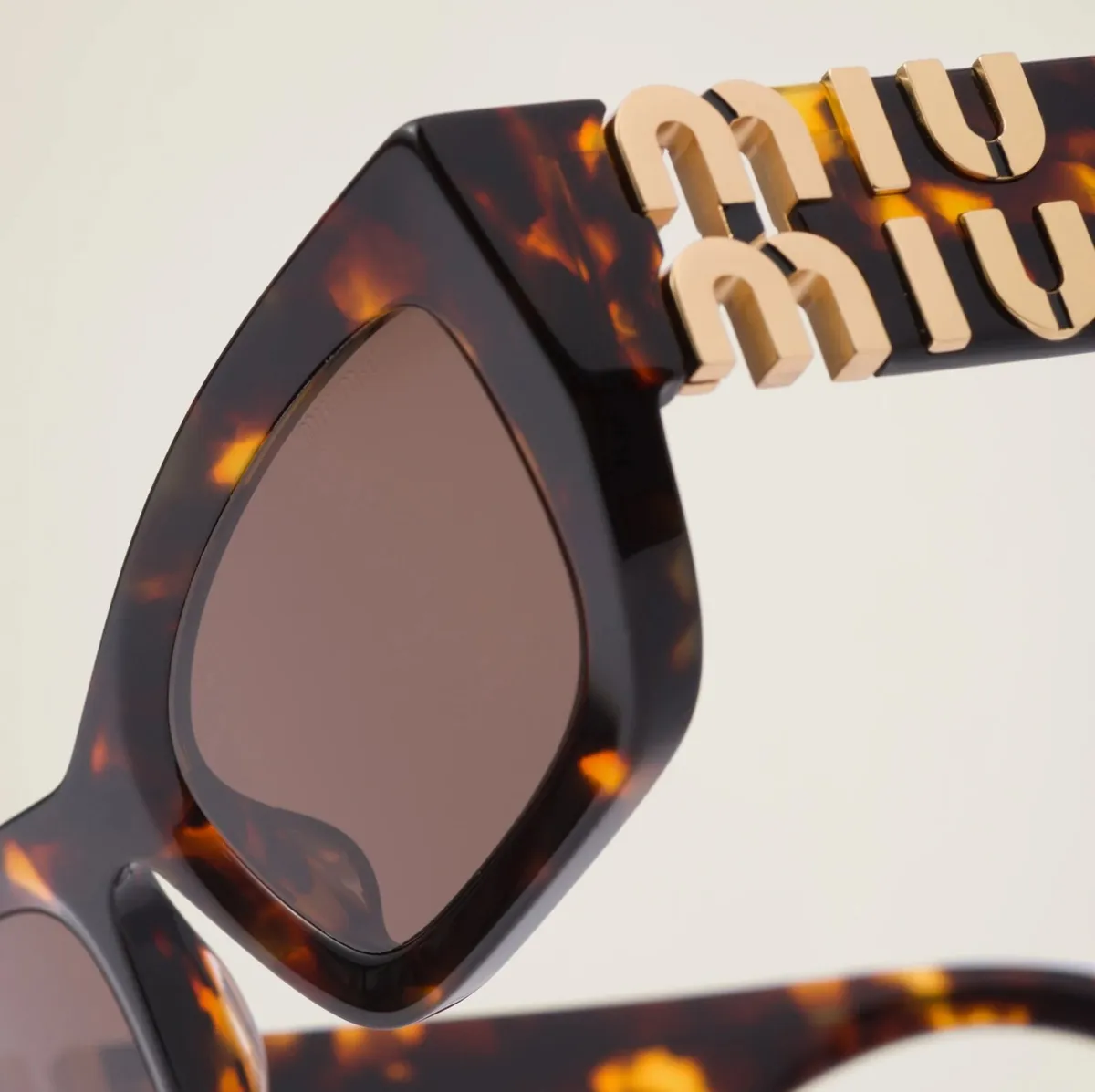 Miu Miu Glimpse Tortoishell Sunglasses Gold Logo - Image 1