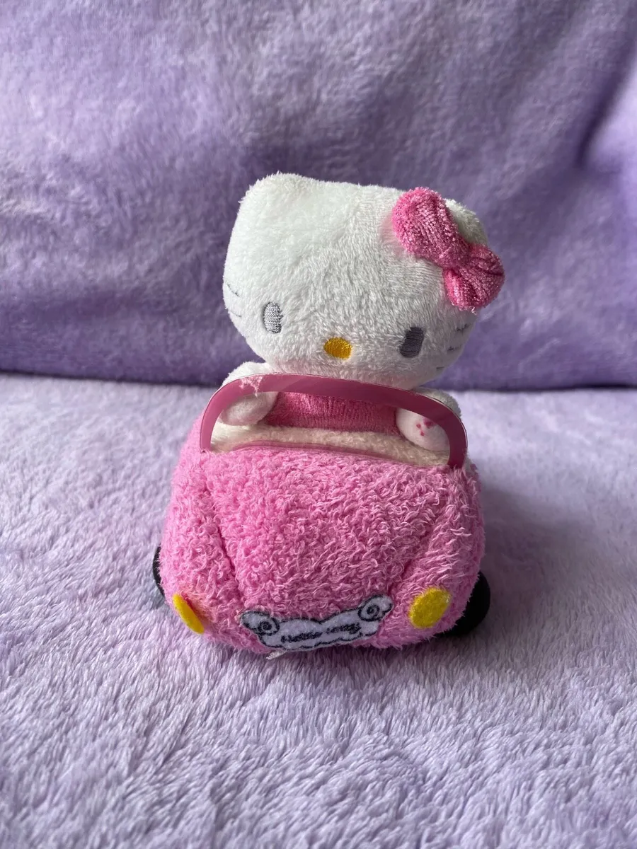 Hello Kitty Mini Car Plush Phone Holder/ Toy - Image 1