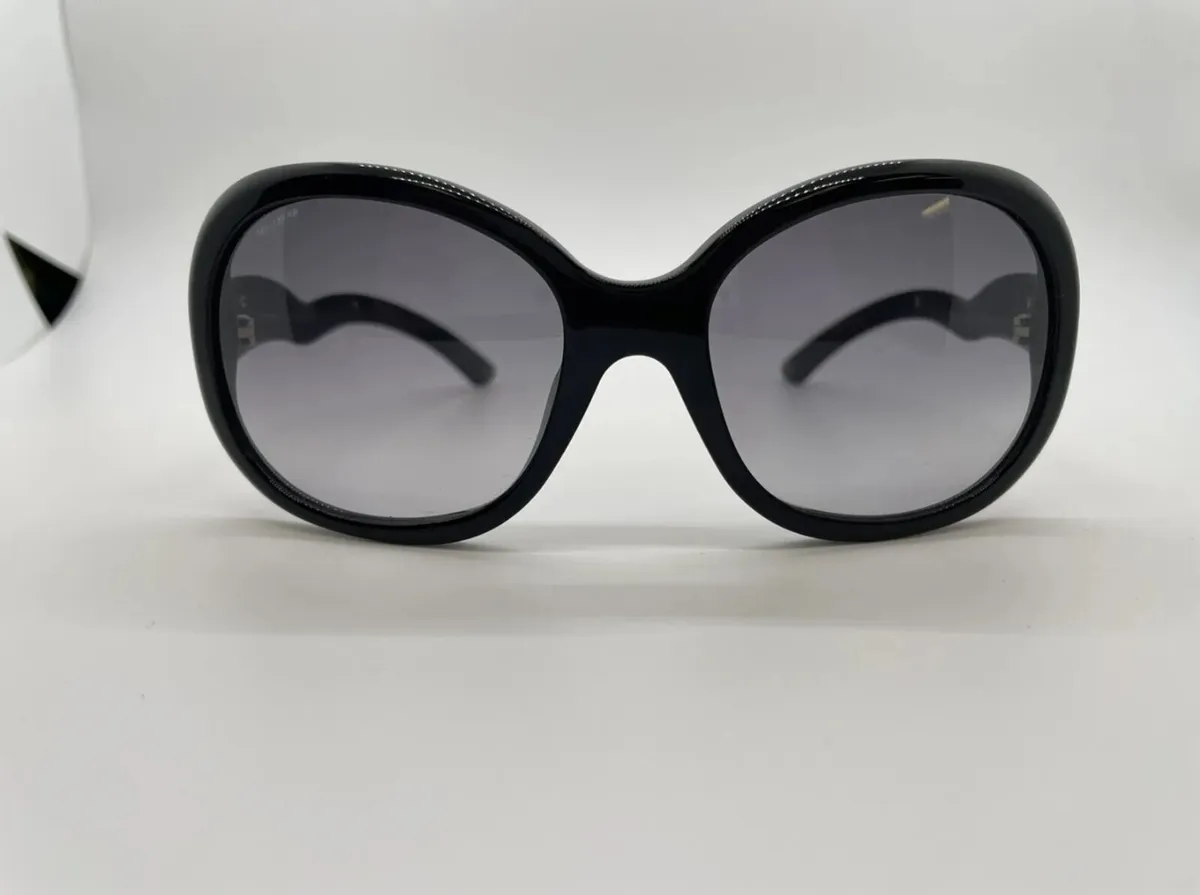Prada SPR08L Black Ladies Sunglasses Silver Wave - Image 1