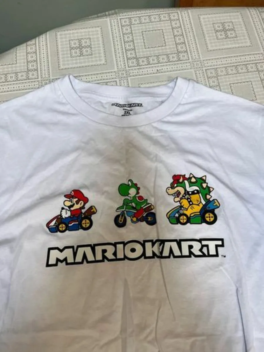 Super Mario Tee Shirts. Size: Large and 2 XL. Ex - Image 1