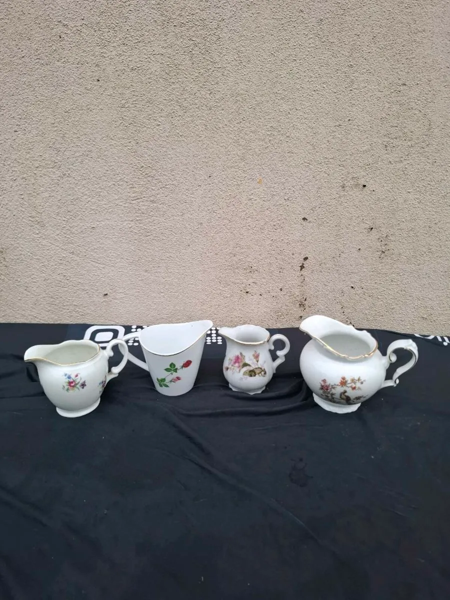 4 china milk jugs postage possible