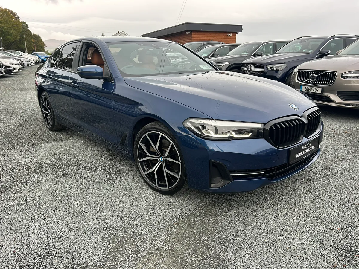 212 BMW 520D Mediterranean Blue on saddle leather - Image 1