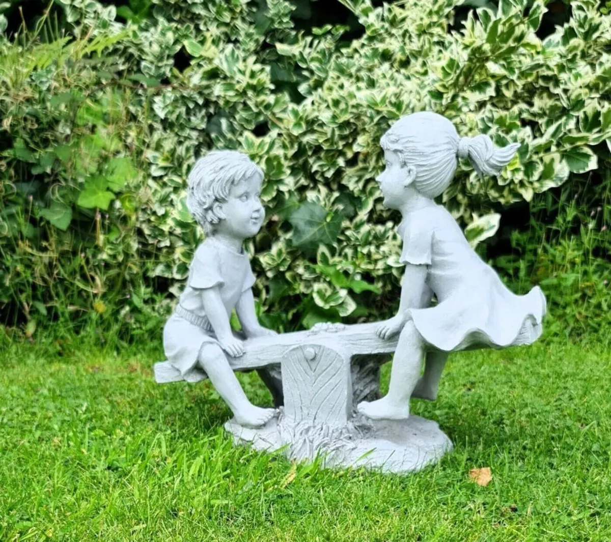 Garden Ornament Boy and Girl Seesaw Stone Effect - Image 1