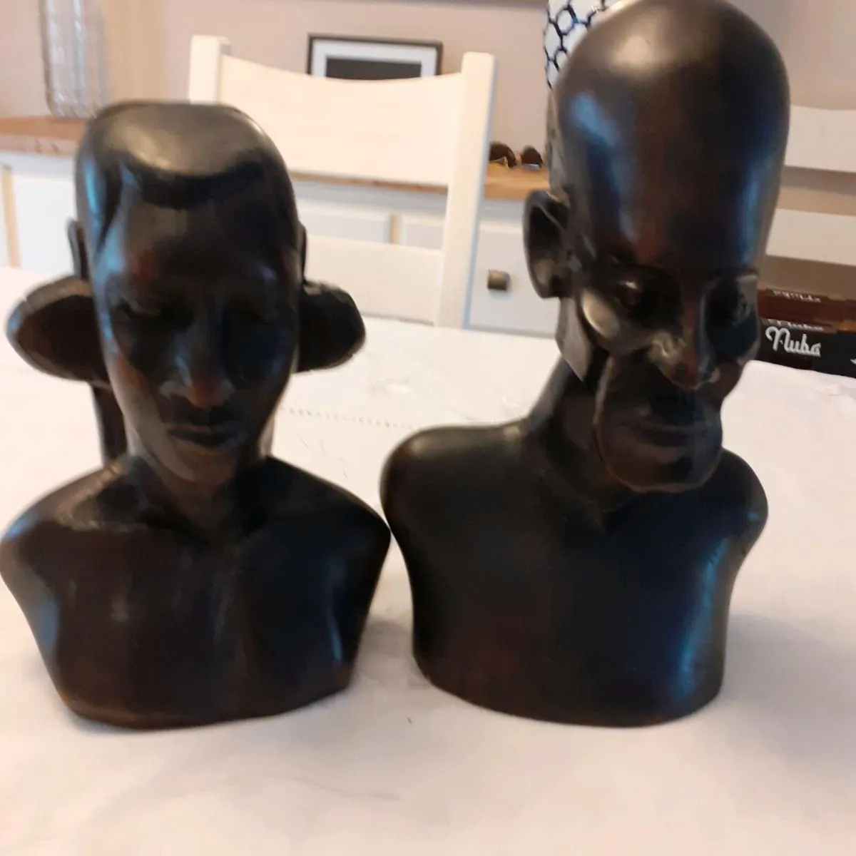 Carved heads - Image 1