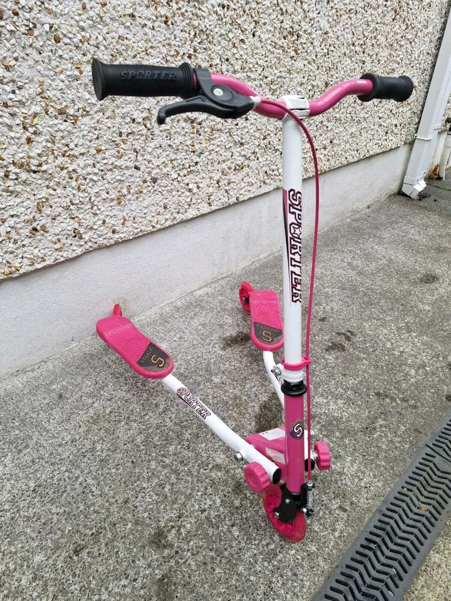 Sporter 3 wheel swing scooter