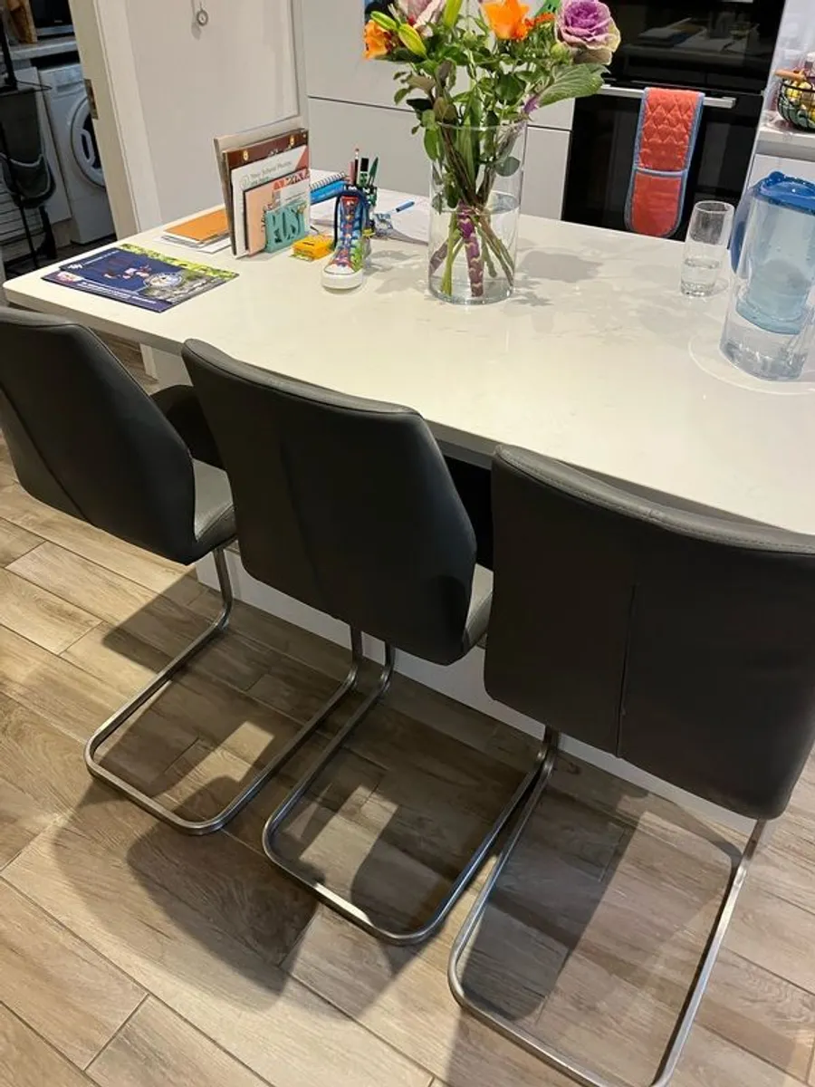 Three stainless steel bar stools. - Image 1